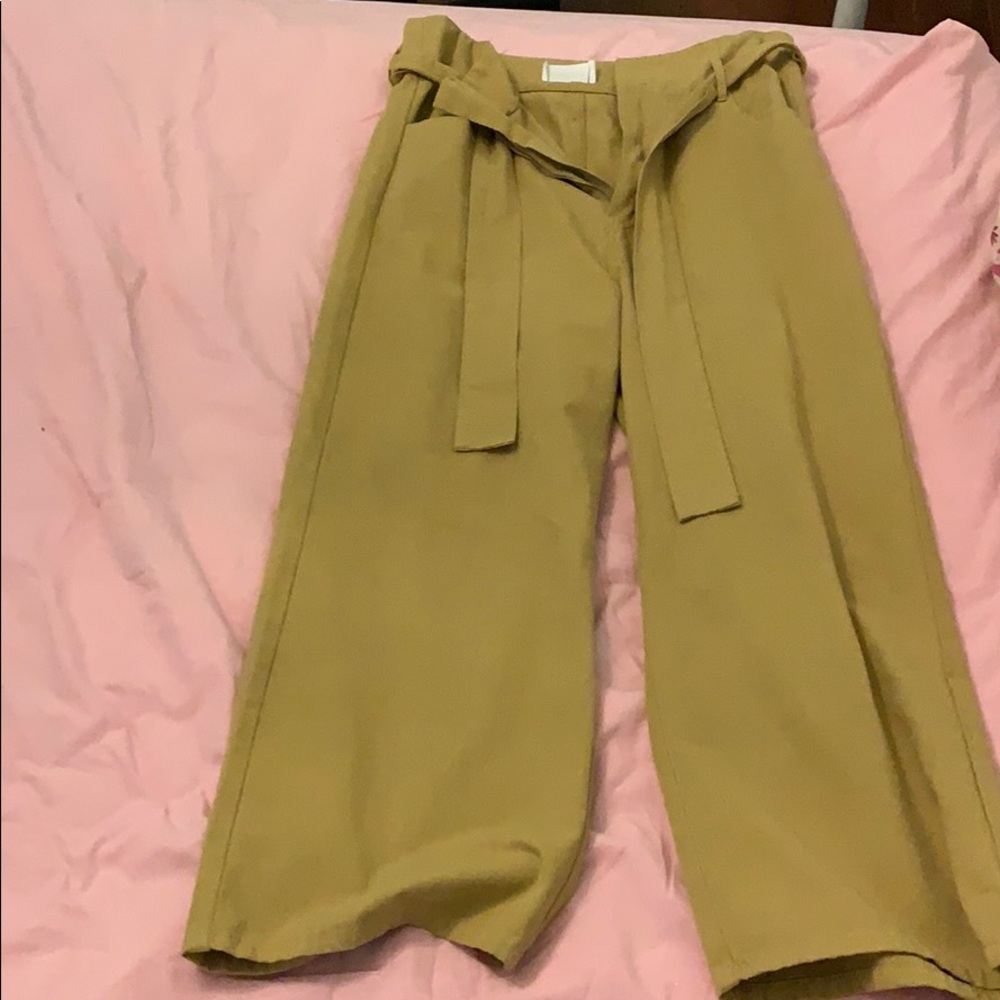 Mustard yellow wide leg pants with tie.